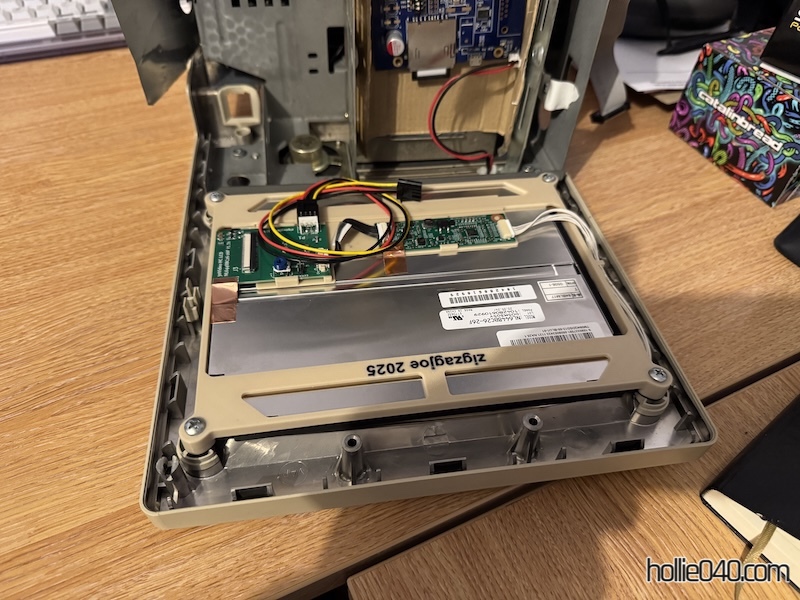 LCD screen fitted to internal bezel