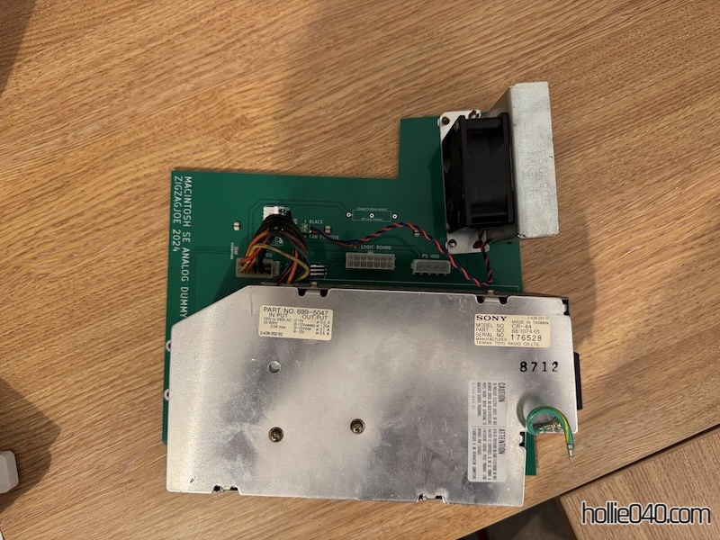 Replacement analogue board with the original fan and power supply attached