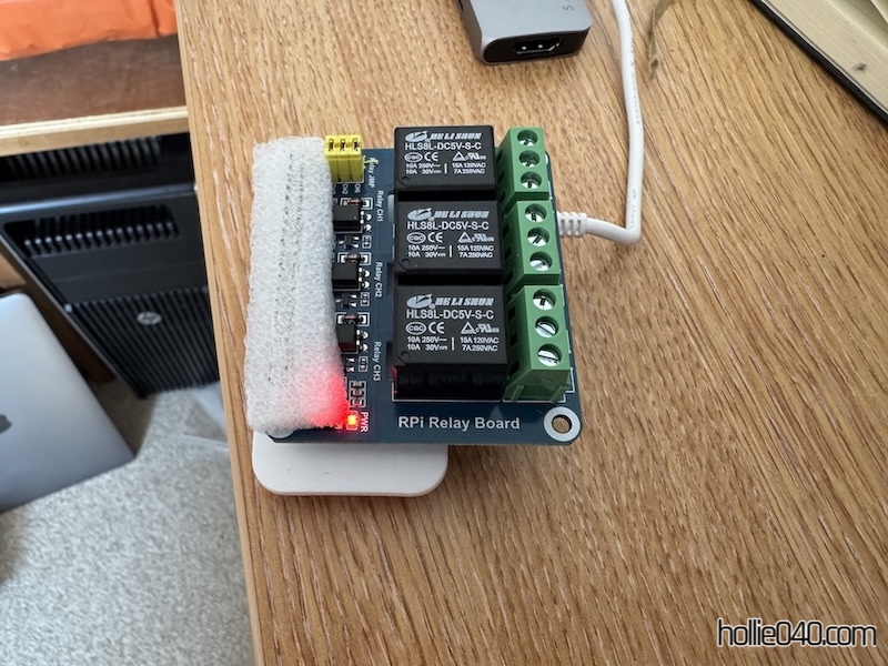 Relay board plugged into the top of a Raspberry Pi Zero